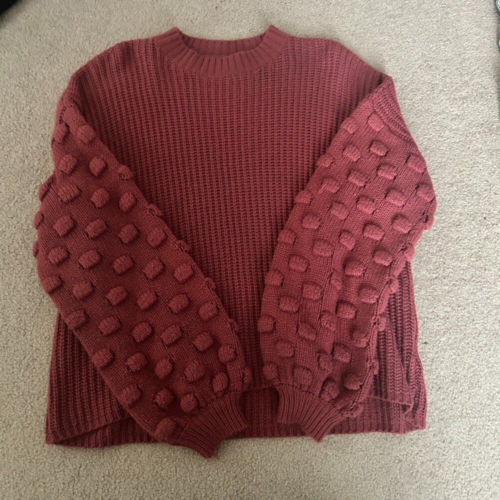 textured sleeve sweater